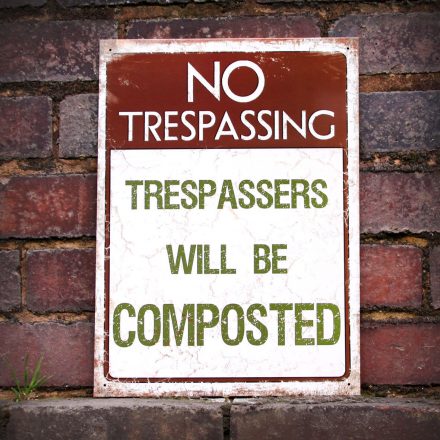 NO TRESPASSING COMPOST METAL SIGN